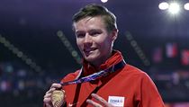 Pavel Maslák se zlatou medailí na halovém MS