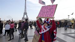 People hold banners during the 