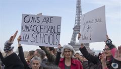 People hold banners during the 