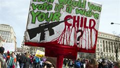 a protester holds a sign during the 