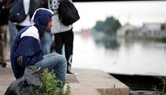 Migrant v táboře, nazývaném podle blízkého obchodního centra Millénaire. | na serveru Lidovky.cz | aktuální zprávy