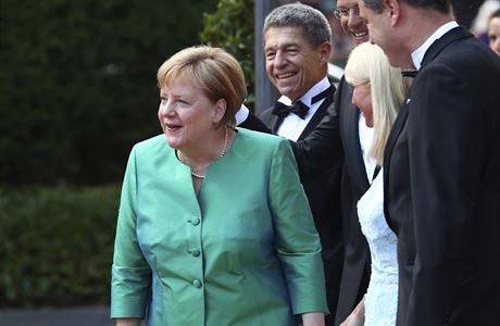 Nmeck kanclka Angela Merkelov se svm manelem Joachimem Sauerem (druh...