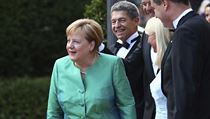 N�meck� kancl��ka Angela Merkelov� se sv�m man�elem Joachimem Sauerem (druh�...