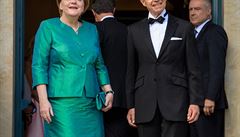 N�mecká kanclé�ka Angela Merkelová se svým man�elem na zahájení hudebních...