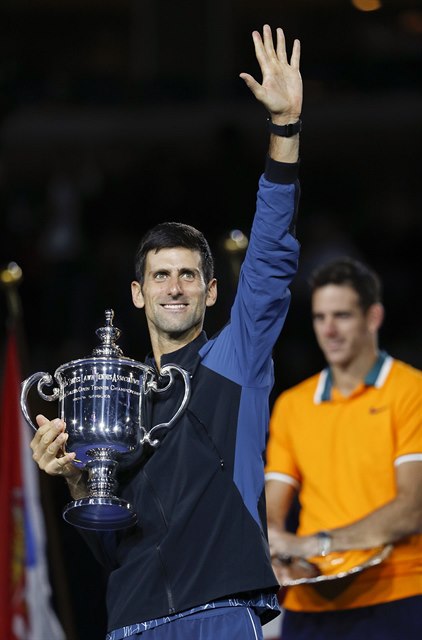 Novak Djokovi se raduje z triumfu na US Open.