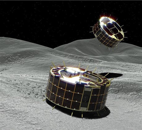 Ilustrace ukazuje dva roboty, kteí úspn pistáli na asteroidu.