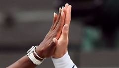 Wimbledon, mix: Serena Williamsová a Andy Murray slaví.