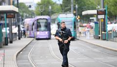 02 August 2019, Hessen, Frankfurt_Main: A policeman armed with a submachine gun...