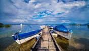 Loďky na jezeře Chiemsee vytváří krásná zátiší, Německo