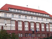 Policie zasahovala v budově Vrchního soudu. Z korupce obvinila soudce a známého pražského advokáta