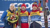 Sergey Ustiugov, centre, and Alexander Bolshunov, right, from Russia and...