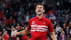 Novak Djokovič oslavuje vítězství v ATP Cupu.
