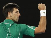 Novak Djokovi se raduje z vtzstv ve finle Australian Open nad Dominicem...