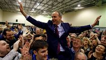 Ldr strany Fianna Fil Micheal Martin slav po oznmen vsledk irskch voleb.