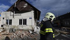 Hasi�i zasahovali v Doberské ulici v Kladn�, kde silný vítr posunul st�echu a...