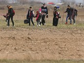 Migranti na Turecko-ecké hranici.
