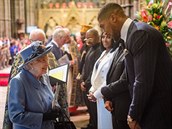 Anthony Joshua a britská královna 9. bezna 2020. V pozadí Princ Charles.