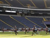 Players vie for the ball during the German Bundesliga soccer match between...