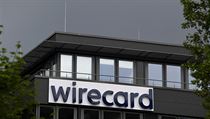 Logo firmy Wirecard v Aschheimu. Nmecko firmu vyetuje kvli podezen z...