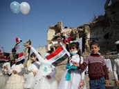 Irácké dti vítají papee v Mosulu.