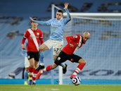 Manchester City's Phil Foden in action with Southampton's Nathan Redmond
