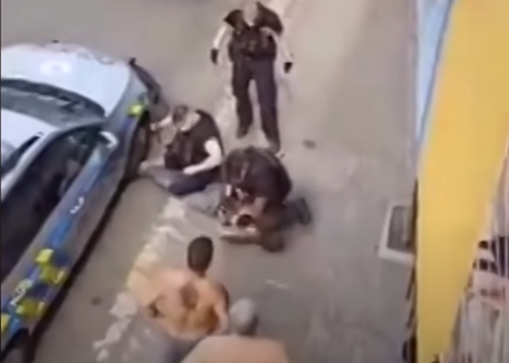 Policejní zákrok na romského mu�e v Teplicích.