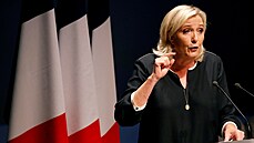 FILE PHOTO: France's far-right leader Marine Le Pen delivers a speech for the...