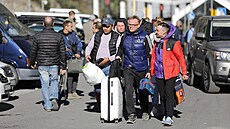 Rusové prchající do Gruzie.