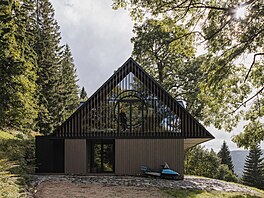 Chalupa ve stráni v Krkono�ích.