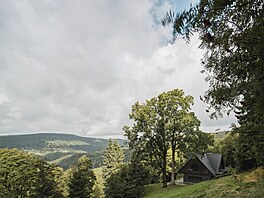 Chalupa ve stráni v Krkono�ích.