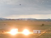 Letouny L-159 Alca předvádějí simulovaný letecký úder ne pozice nepřítele na Dnech NATO v Ostravě