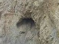 Veletok mokrého písku pod vývrovou jeskyní
