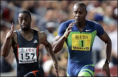 Asafa Powell (vpravo), Tyson Gay