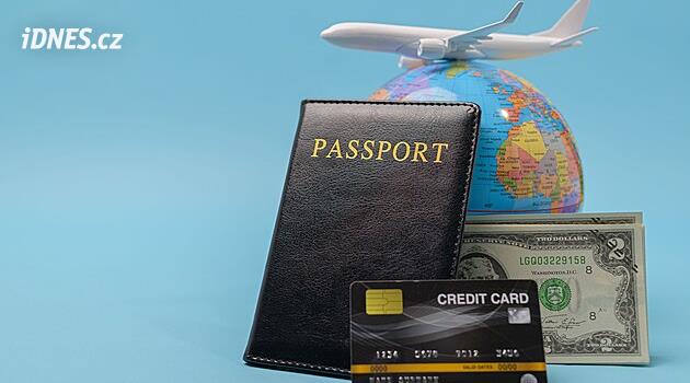Traveler checking passport and documents at an airport before an international flight outside the EU